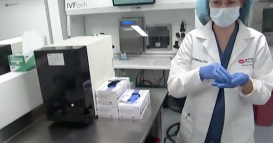 A lab technician freezing eggs