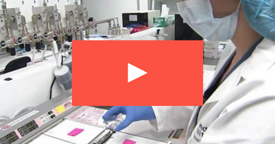 A banner of a lab technician working