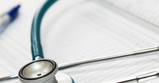 A stethoscope on a book