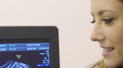 A woman looking at an ultrasound screen